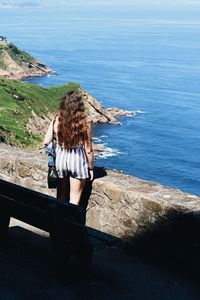 Woman looking at sea