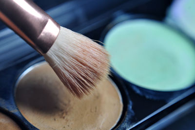 Close-up of make-up brusk on cream