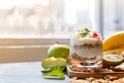 Close-up of fruits in glass on table