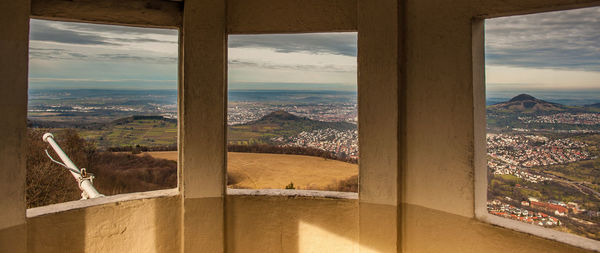 View of sea seen through window