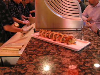 Close-up of man preparing food