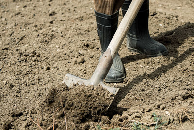 Low section of man working at construction site