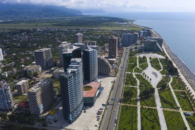 High angle view of buildings in city against sky