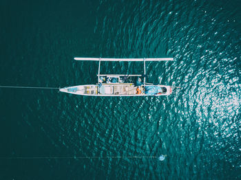 Directly above shot of outrigger canoe on seascape