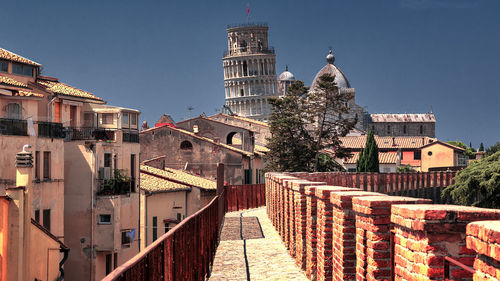 Buildings in city against sky