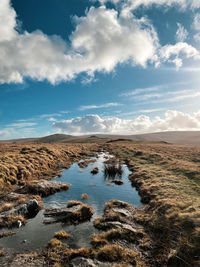 Scenic view of land against sky