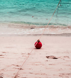 High angle view of fishing net on beach
