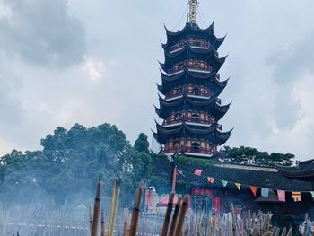 Low angle view of pagoda against sky