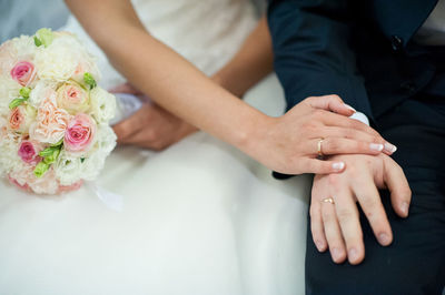 Midsection of couple during wedding