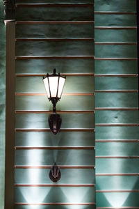 Electric lamp hanging on ceiling