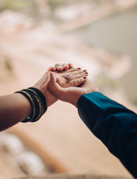 Close-up of hand holding hands