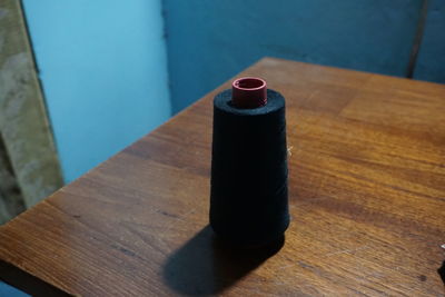 High angle view of coffee cup on table