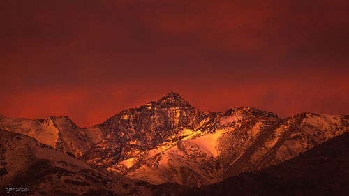 Scenic view of mountain against sky during sunset
