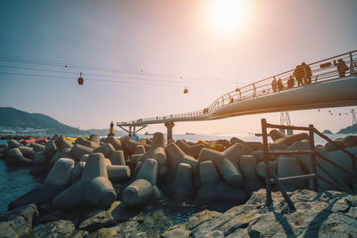 View of cable car over sea against sky