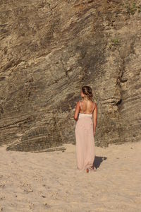 Woman standing on beach