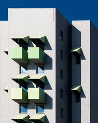 Low angle view of building against blue sky