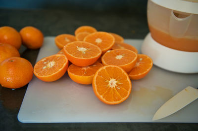 Close-up of orange fruits on table