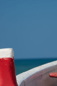 Close-up of sea against blue sky