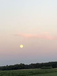 Scenic view of landscape against sky during sunset