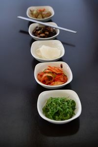 High angle view of salad in bowl on table