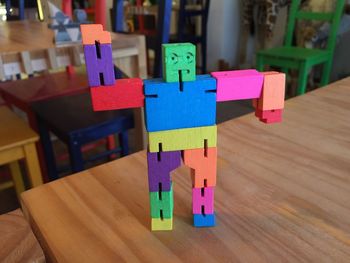 Close-up of toys on wooden table