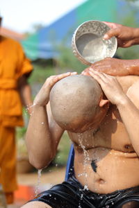 Close-up of hand holding water fountain