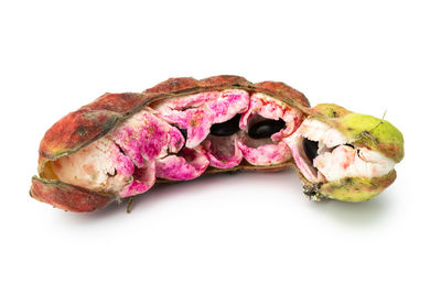 Close-up of fresh fruit against white background