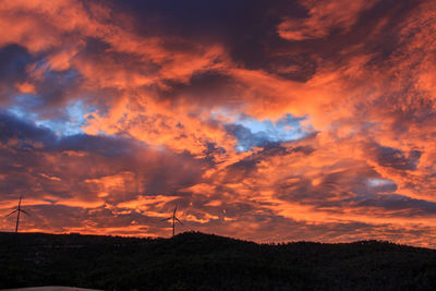 Group of windmills in mountain at sunrise