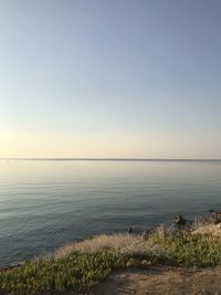 Scenic view of sea against clear sky