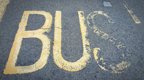 High angle view of road sign on street