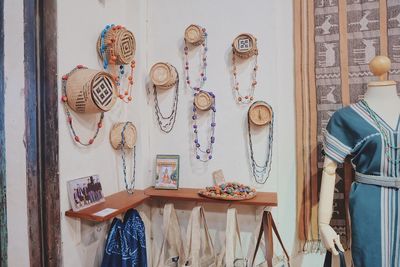 Clothes hanging on table against wall