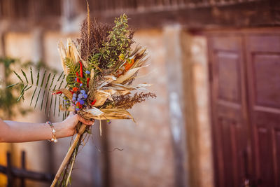 Authentic country style wedding reception interiors and decorations, dried plants and flowers