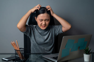 Man using laptop on table