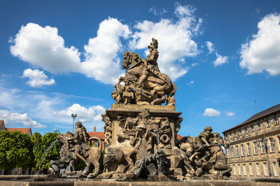 Low angle view of statue against sky