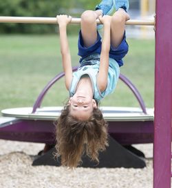 Portrait of happy girl playing on playground