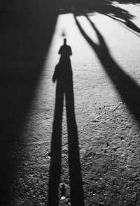 Shadow of people on wall