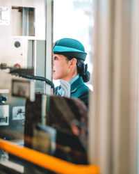 Side view of young man looking away