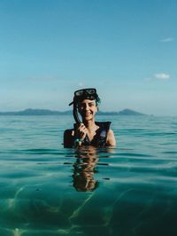 Portrait of girl in swimming in sea