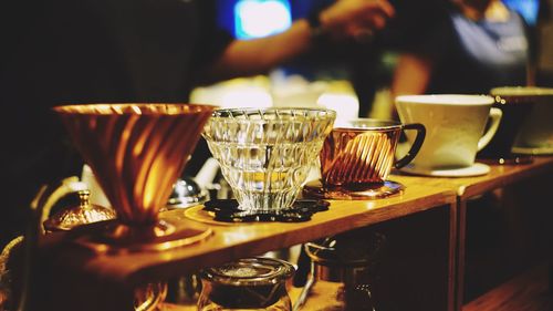 Close-up of coffee cups on counter