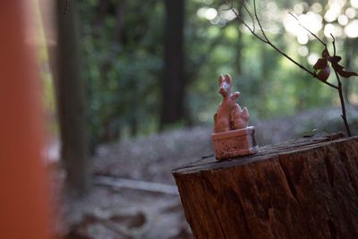 Figurine on wood