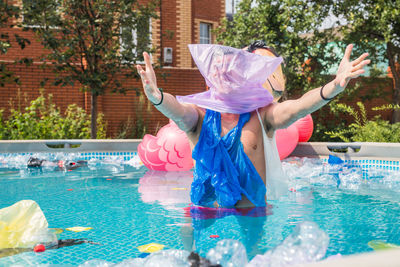 Full length of girl in swimming pool