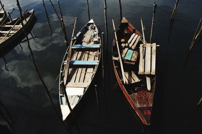 High angle view of sailboats moored in sea