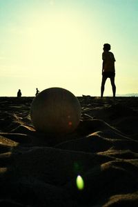 Silhouette of girl in sky