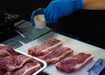 Close-up of preparing food on table