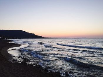 Scenic view of sea at sunset