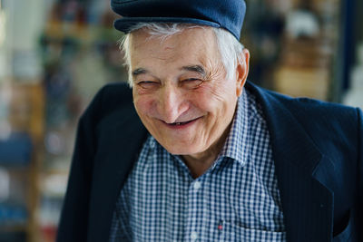 Portrait of man wearing hat