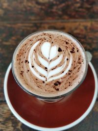 Close-up of cappuccino on table