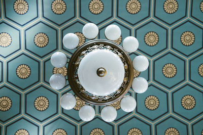 Directly below shot of chandelier on ceiling