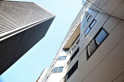 Low angle view of buildings against clear sky