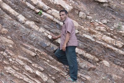 Full length of man walking on steps